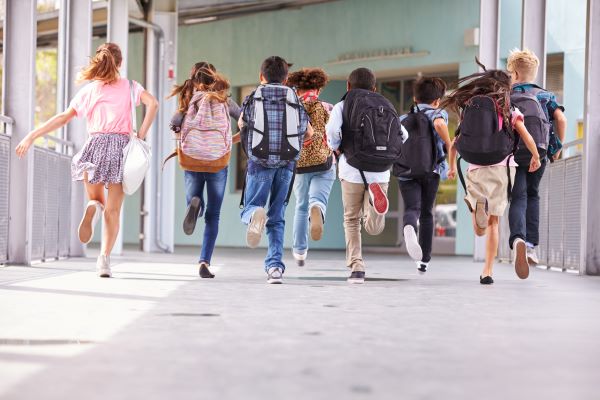 Children running at school